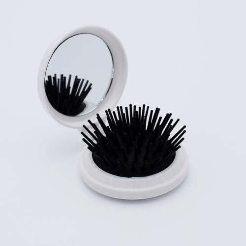 DIY Decoden customizable compact brush with mirror, adorned with charms and frosting-inspired glue, in white for easy touch-ups.