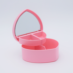 DIY Decoden customizable heart-shaped jewelry box with two-tier design and built-in mirror, ready to be decorated with frosting-inspired glues, decorative sprinkles, and charms.
