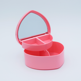 DIY Decoden customizable heart-shaped jewelry box with two-tier design and built-in mirror, ready to be decorated with frosting-inspired glues, decorative sprinkles, and charms.
