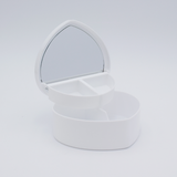 DIY Decoden customizable heart-shaped jewelry box with two-tier design and built-in mirror, ready to be decorated with frosting-inspired glues, decorative sprinkles, and charms.