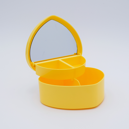 DIY Decoden customizable heart-shaped jewelry box with two-tier design and built-in mirror, ready to be decorated with frosting-inspired glues, decorative sprinkles, and charms.