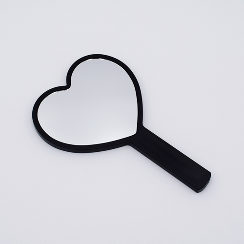 DIY Decoden customizable hand-held heart mirror in black with frosting-inspired glues, sprinkles, and charms, perfect for adding a personal touch to your routine.