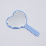 DIY Decoden customizable hand-held heart mirror in pastel blue with frosting-inspired glues, sprinkles, and charms, perfect for adding a personal touch to your routine.