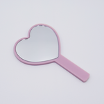 DIY Decoden customizable hand-held heart mirror in soft pink with frosting-inspired glues, sprinkles, and charms, perfect for adding a personal touch to your routine.