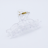 DIY Decoden customizable large hair claw in various colors, with frosting-inspired glue, decorative sprinkles, and charms, ready for decoration.