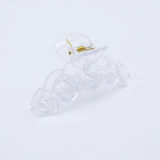 DIY Decoden customizable large hair claw in various colors, with frosting-inspired glue, decorative sprinkles, and charms, ready for decoration.