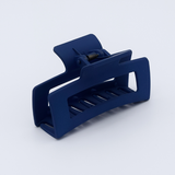 DIY Decoden customizable large hair claw in various colors, with frosting-inspired glue, decorative sprinkles, and charms, ready for decoration.