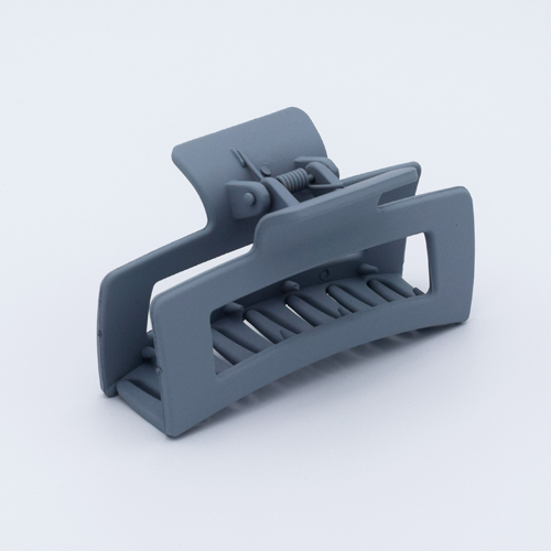 DIY Decoden customizable large hair claw in various colors, with frosting-inspired glue, decorative sprinkles, and charms, ready for decoration.