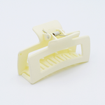 DIY Decoden customizable large hair claw in various colors, with frosting-inspired glue, decorative sprinkles, and charms, ready for decoration.