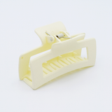 DIY Decoden customizable large hair claw in various colors, with frosting-inspired glue, decorative sprinkles, and charms, ready for decoration.