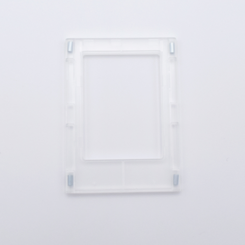 DIY Decoden customizable clear Polaroid loader frames with frosting-inspired glue, decorative sprinkles, charms, and magnets for personalizing your photos.