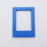 DIY Decoden customizable muted blue  Polaroid loader frames with frosting-inspired glue, decorative sprinkles, charms, and magnets for personalizing your photos.