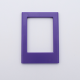 DIY Decoden customizable amethyst Polaroid loader frames with frosting-inspired glue, decorative sprinkles, charms, and magnets for personalizing your photos.