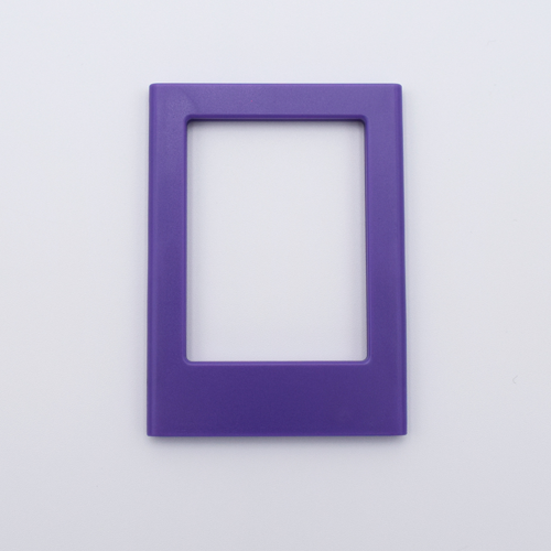 DIY Decoden customizable amethyst Polaroid loader frames with frosting-inspired glue, decorative sprinkles, charms, and magnets for personalizing your photos.