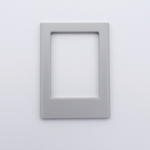 DIY Decoden customizable light gray Polaroid loader frames with frosting-inspired glue, decorative sprinkles, charms, and magnets for personalizing your photos.