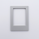 DIY Decoden customizable light gray Polaroid loader frames with frosting-inspired glue, decorative sprinkles, charms, and magnets for personalizing your photos.