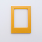 DIY Decoden customizable tangerine  Polaroid loader frames with frosting-inspired glue, decorative sprinkles, charms, and magnets for personalizing your photos.