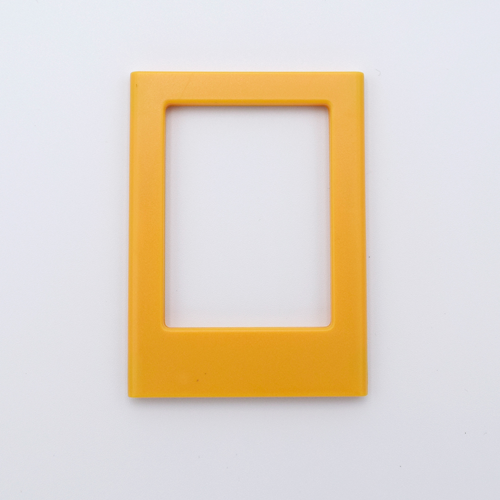 DIY Decoden customizable tangerine  Polaroid loader frames with frosting-inspired glue, decorative sprinkles, charms, and magnets for personalizing your photos.