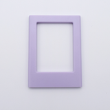 DIY Decoden customizable lilac Polaroid loader frames with frosting-inspired glue, decorative sprinkles, charms, and magnets for personalizing your photos.