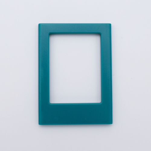 DIY Decoden customizable teal  Polaroid loader frames with frosting-inspired glue, decorative sprinkles, charms, and magnets for personalizing your photos.