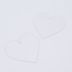 DIY Decoden customizable heart-shaped acrylic ornament with frosting-inspired glue, decorative sprinkles, charms, and a color choice of string, perfect for hanging on bags or keychains.