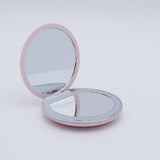 DIY Decoden customizable compact LED mirror in green with frosting-inspired glues, decorative sprinkles, and charms for personalization. Includes built-in LED light and charging cable.