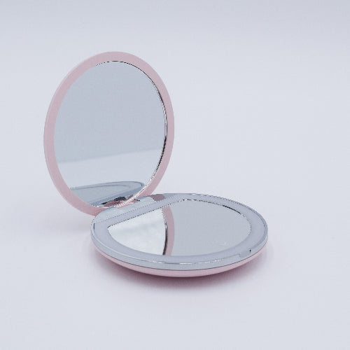 DIY Decoden customizable compact LED mirror in green with frosting-inspired glues, decorative sprinkles, and charms for personalization. Includes built-in LED light and charging cable.