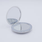 DIY Decoden customizable compact LED mirror in green with frosting-inspired glues, decorative sprinkles, and charms for personalization. Includes built-in LED light and charging cable.